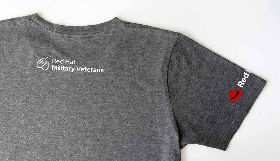 Red Hat Military Veterans DEI community logo with Red Hat logo being used on a t-shirt.